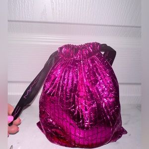 Mac makeup bag with 11 empty mac containers for turn in program